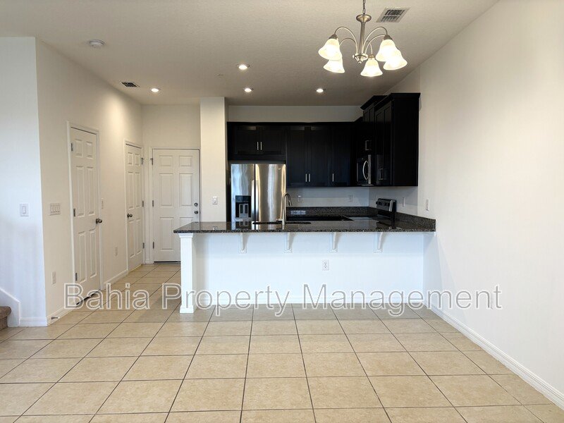 Stunning 3 BR/2.5BA Townhome in Gated Randal Walk with Water Views & 2-Car Garage! property image