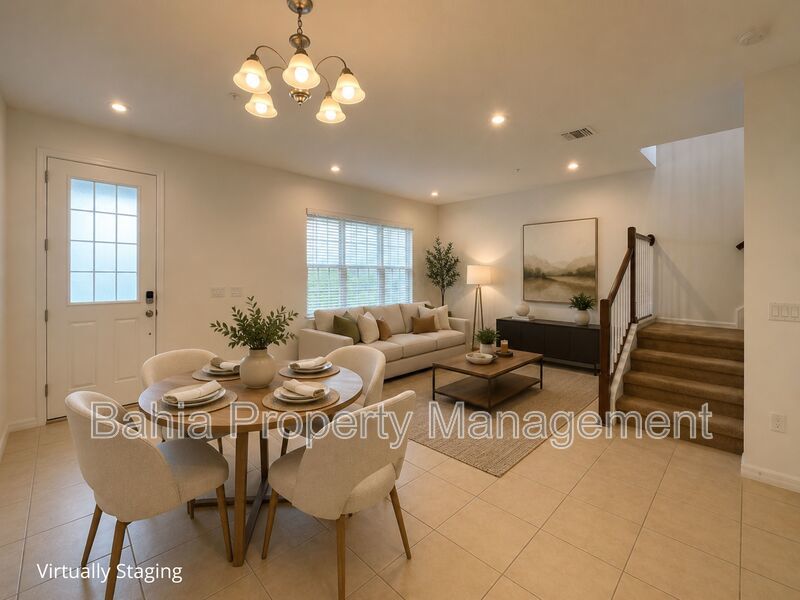 Stunning 3 BR/2.5BA Townhome in Gated Randal Walk with Water Views & 2-Car Garage! property image