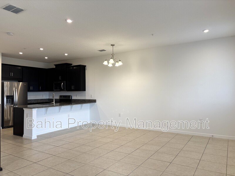 Stunning 3 BR/2.5BA Townhome in Gated Randal Walk with Water Views & 2-Car Garage! property image