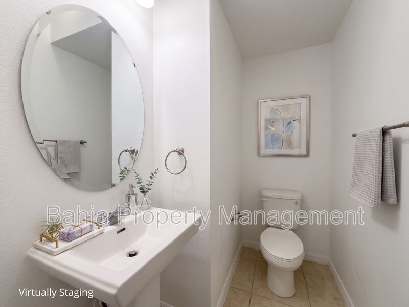 Stunning 3 BR/2.5BA Townhome in Gated Randal Walk with Water Views & 2-Car Garage! property image