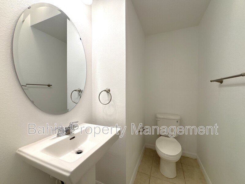 Stunning 3 BR/2.5BA Townhome in Gated Randal Walk with Water Views & 2-Car Garage! property image