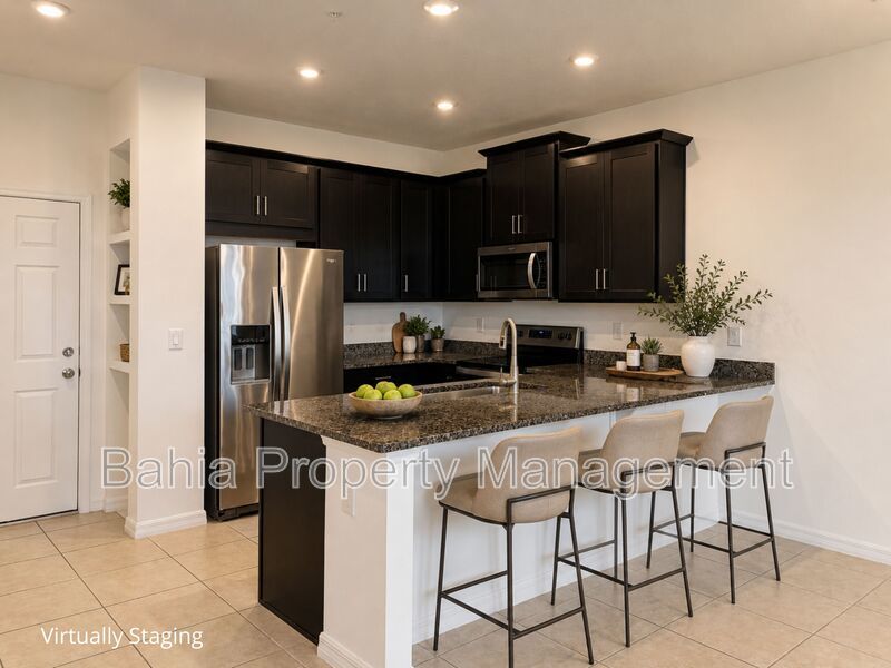 Stunning 3 BR/2.5BA Townhome in Gated Randal Walk with Water Views & 2-Car Garage! property image