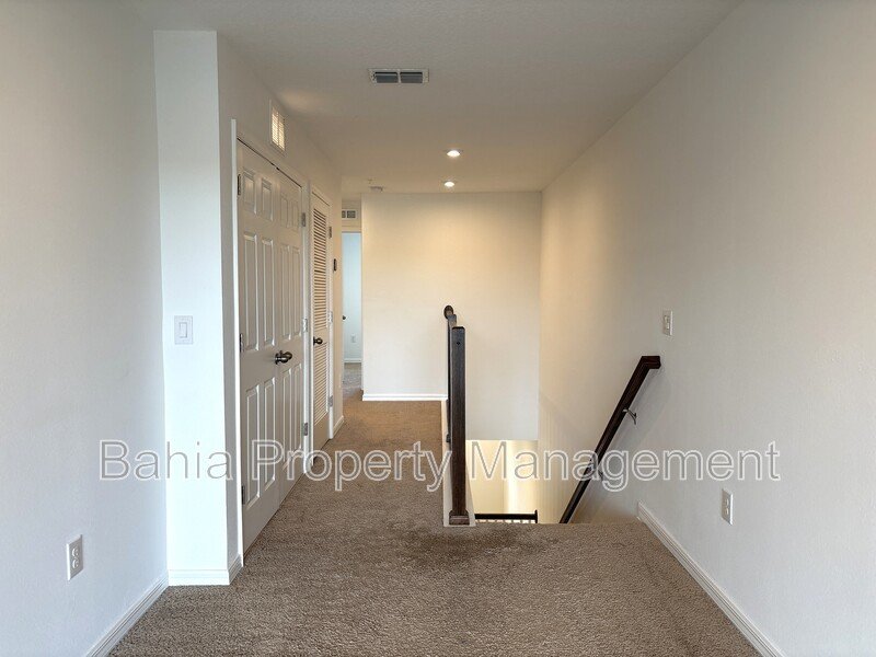 Stunning 3 BR/2.5BA Townhome in Gated Randal Walk with Water Views & 2-Car Garage! property image
