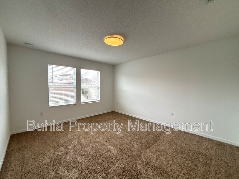 Stunning 3 BR/2.5BA Townhome in Gated Randal Walk with Water Views & 2-Car Garage! property image