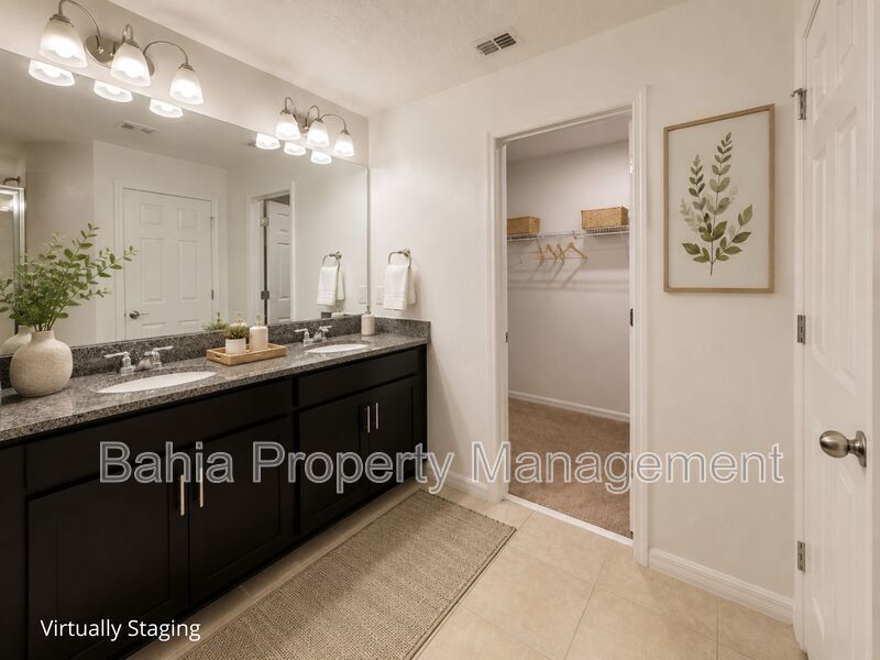 Stunning 3 BR/2.5BA Townhome in Gated Randal Walk with Water Views & 2-Car Garage! property image