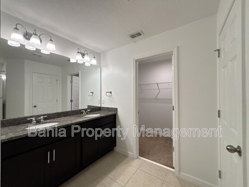 Stunning 3 BR/2.5BA Townhome in Gated Randal Walk with Water Views & 2-Car Garage! property image