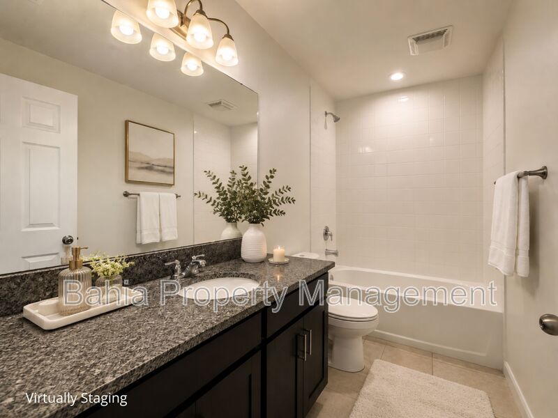 Stunning 3 BR/2.5BA Townhome in Gated Randal Walk with Water Views & 2-Car Garage! property image