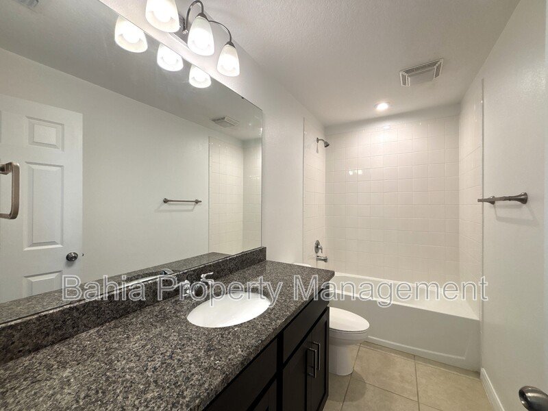 Stunning 3 BR/2.5BA Townhome in Gated Randal Walk with Water Views & 2-Car Garage! property image