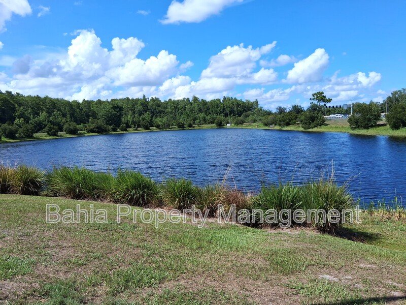 Stunning 3 BR/2.5BA Townhome in Gated Randal Walk with Water Views & 2-Car Garage! property image