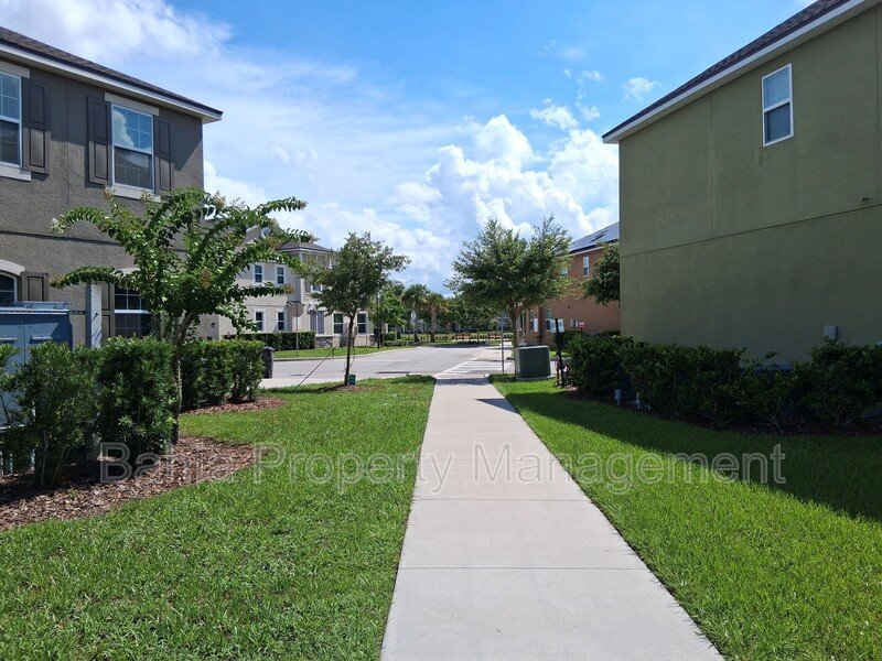 Stunning 3 BR/2.5BA Townhome in Gated Randal Walk with Water Views & 2-Car Garage! property image