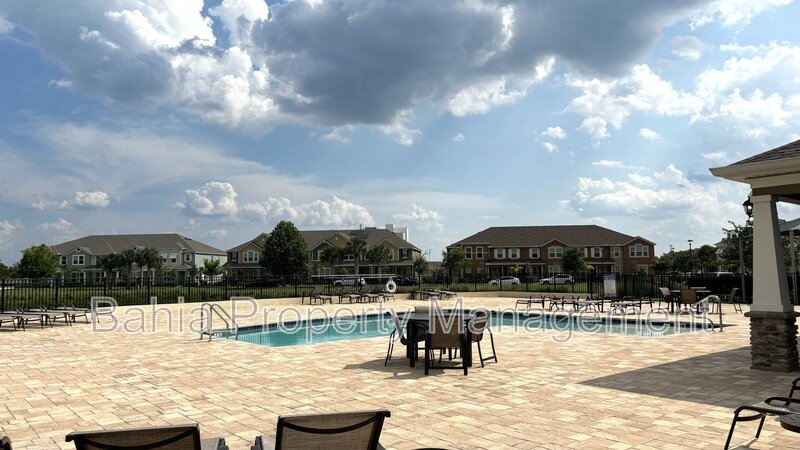Stunning 3 BR/2.5BA Townhome in Gated Randal Walk with Water Views & 2-Car Garage! property image
