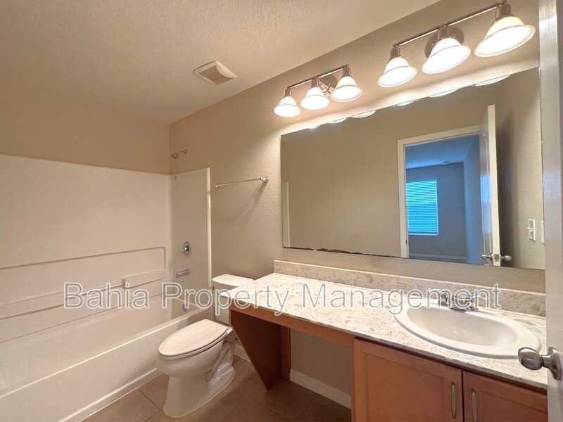 Luxury 4 Bed | 3.5 Bath Townhome in Resort-Style Gated Community. Prime Location Near Disney! property image