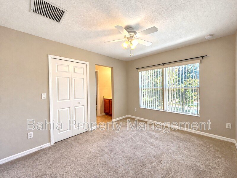 Must-See 3BR/2.5BA Corner Townhome | Resort-Style Living in Signature Lakes | Private Courtyard property image