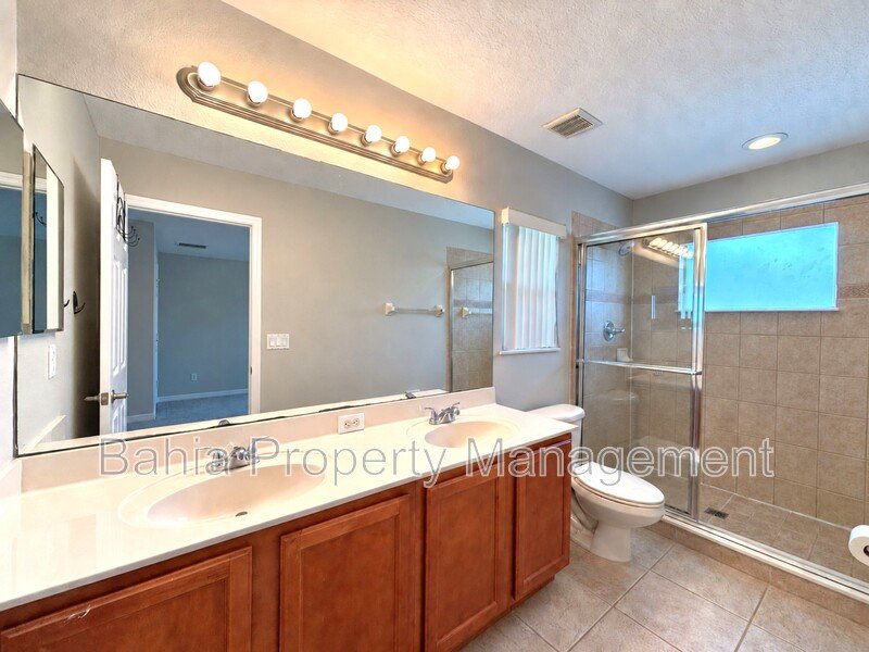 Must-See 3BR/2.5BA Corner Townhome | Resort-Style Living in Signature Lakes | Private Courtyard property image