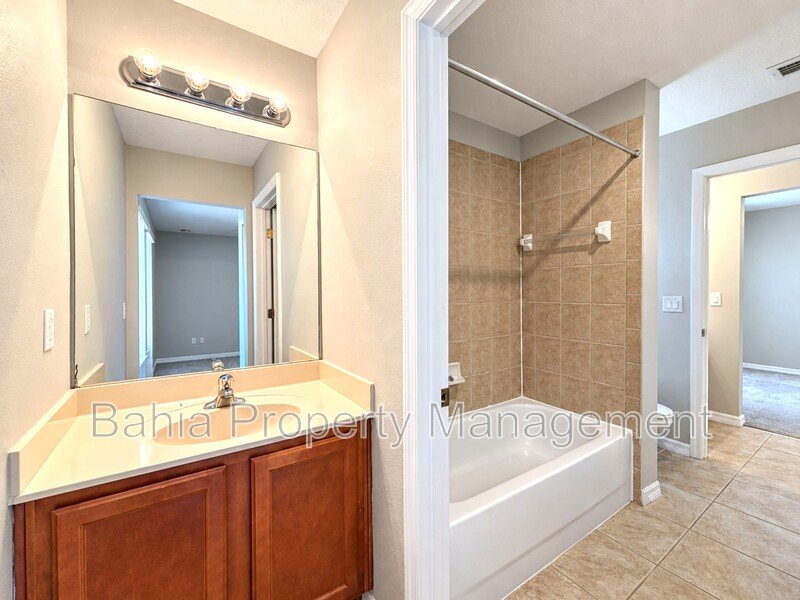 Must-See 3BR/2.5BA Corner Townhome | Resort-Style Living in Signature Lakes | Private Courtyard property image
