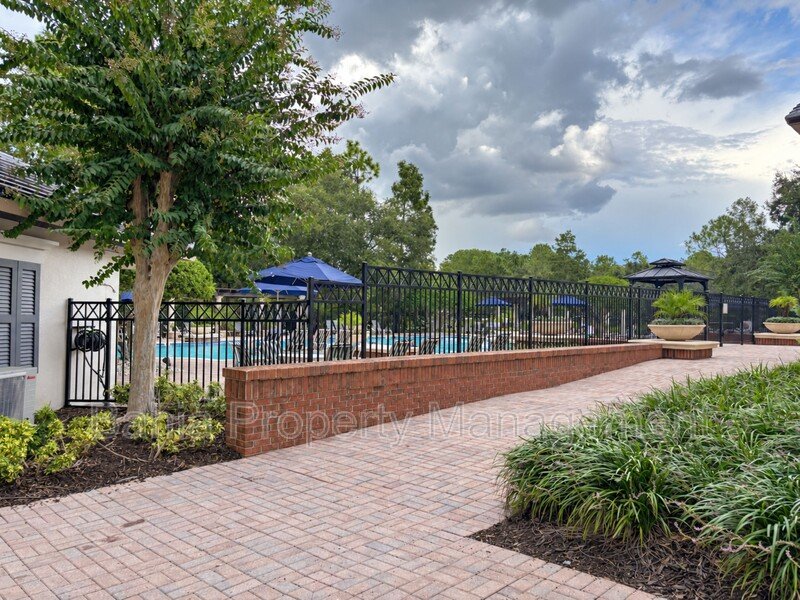 Must-See 3BR/2.5BA Corner Townhome | Resort-Style Living in Signature Lakes | Private Courtyard property image
