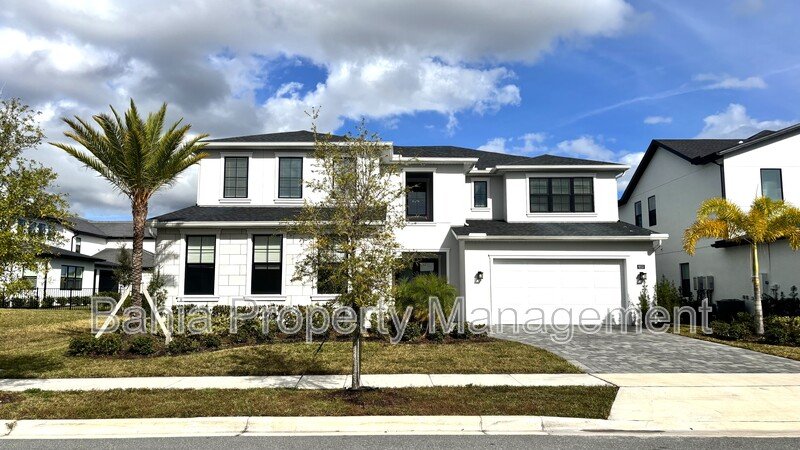 Stunning Lake Nona Luxury Home | 5 Bed, 4.5 Bath, 3-Car Garage, Pond Views & Resort Amenities property image