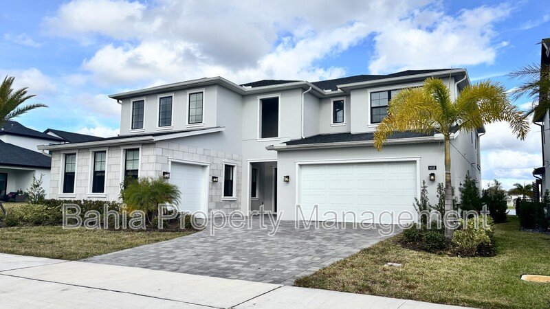 Stunning Lake Nona Luxury Home | 5 Bed, 4.5 Bath, 3-Car Garage, Pond Views & Resort Amenities property image