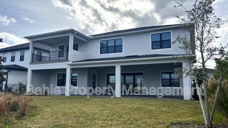 Stunning Lake Nona Luxury Home | 5 Bed, 4.5 Bath, 3-Car Garage, Pond Views & Resort Amenities property image