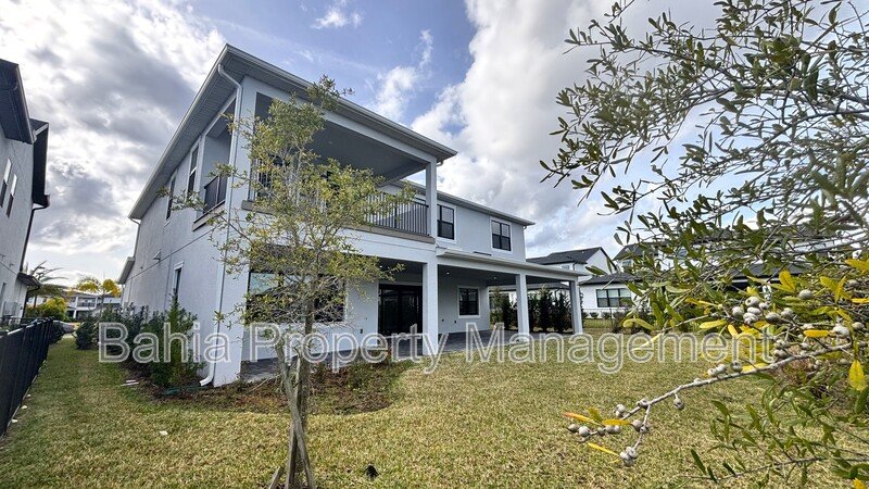 Stunning Lake Nona Luxury Home | 5 Bed, 4.5 Bath, 3-Car Garage, Pond Views & Resort Amenities property image
