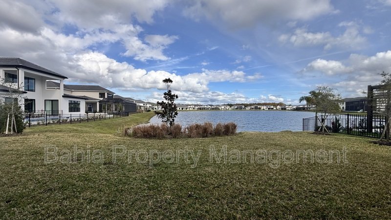 Stunning Lake Nona Luxury Home | 5 Bed, 4.5 Bath, 3-Car Garage, Pond Views & Resort Amenities property image