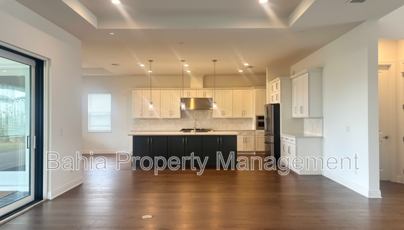 Stunning Lake Nona Luxury Home | 5 Bed, 4.5 Bath, 3-Car Garage, Pond Views & Resort Amenities property image