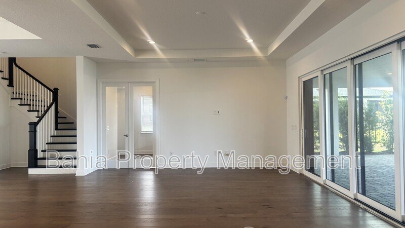 Stunning Lake Nona Luxury Home | 5 Bed, 4.5 Bath, 3-Car Garage, Pond Views & Resort Amenities property image