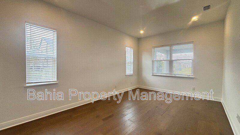 Stunning Lake Nona Luxury Home | 5 Bed, 4.5 Bath, 3-Car Garage, Pond Views & Resort Amenities property image