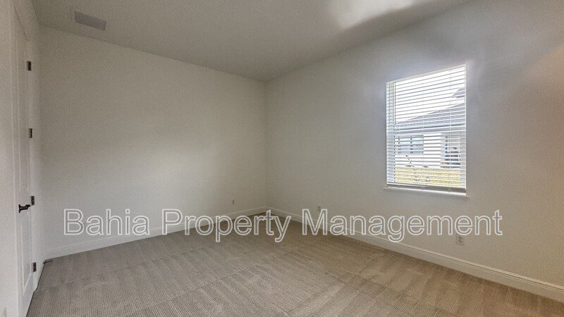 Stunning Lake Nona Luxury Home | 5 Bed, 4.5 Bath, 3-Car Garage, Pond Views & Resort Amenities property image