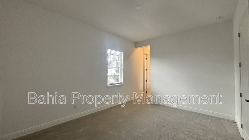 Stunning Lake Nona Luxury Home | 5 Bed, 4.5 Bath, 3-Car Garage, Pond Views & Resort Amenities property image