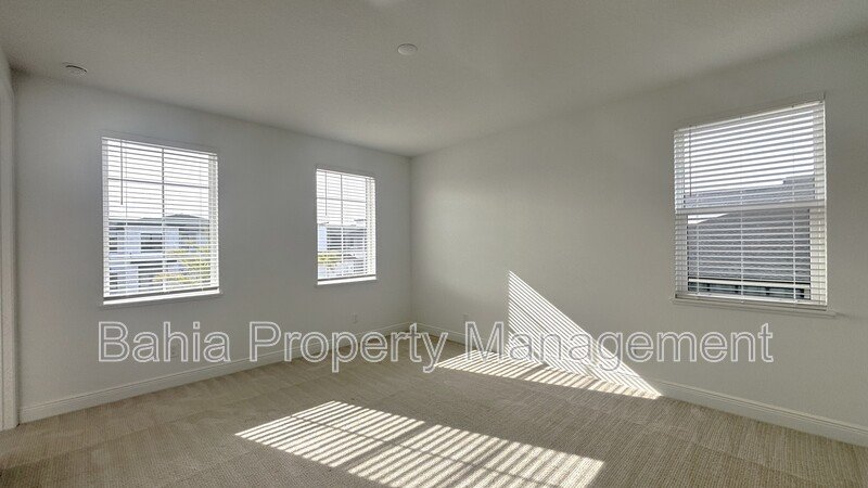 Stunning Lake Nona Luxury Home | 5 Bed, 4.5 Bath, 3-Car Garage, Pond Views & Resort Amenities property image