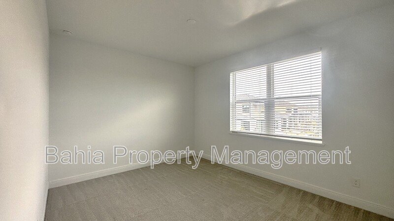 Stunning Lake Nona Luxury Home | 5 Bed, 4.5 Bath, 3-Car Garage, Pond Views & Resort Amenities property image