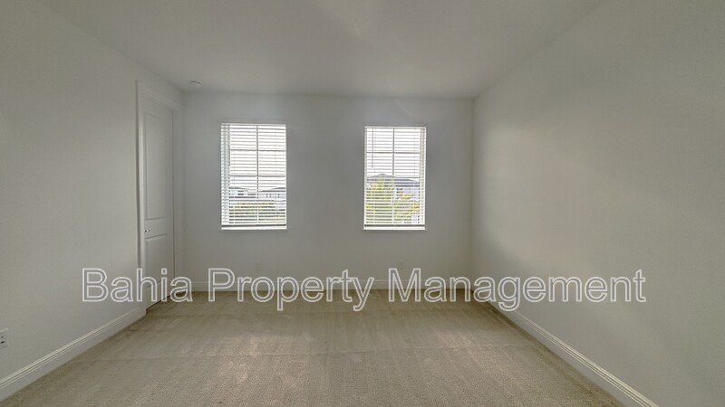 Stunning Lake Nona Luxury Home | 5 Bed, 4.5 Bath, 3-Car Garage, Pond Views & Resort Amenities property image