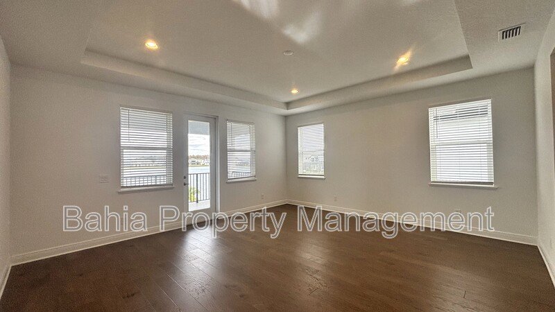 Stunning Lake Nona Luxury Home | 5 Bed, 4.5 Bath, 3-Car Garage, Pond Views & Resort Amenities property image