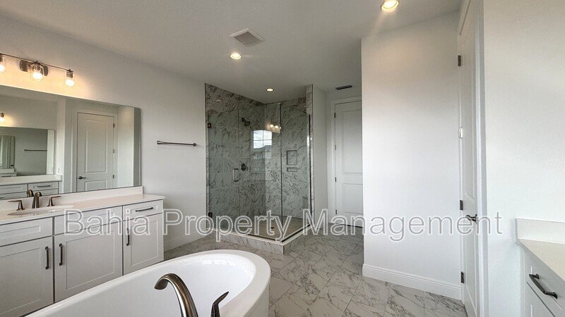 Stunning Lake Nona Luxury Home | 5 Bed, 4.5 Bath, 3-Car Garage, Pond Views & Resort Amenities property image