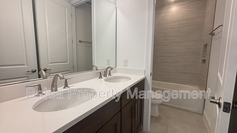 Stunning Lake Nona Luxury Home | 5 Bed, 4.5 Bath, 3-Car Garage, Pond Views & Resort Amenities property image